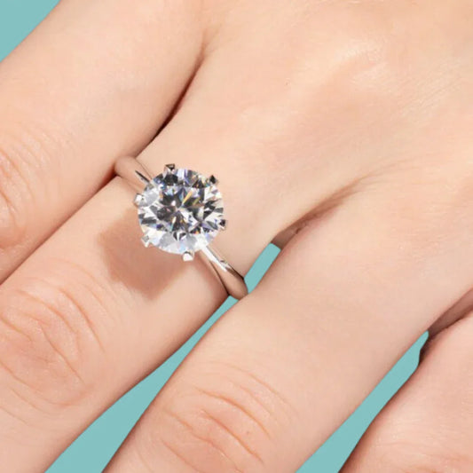 6 claw moissanite solitaire ring with knife edge band