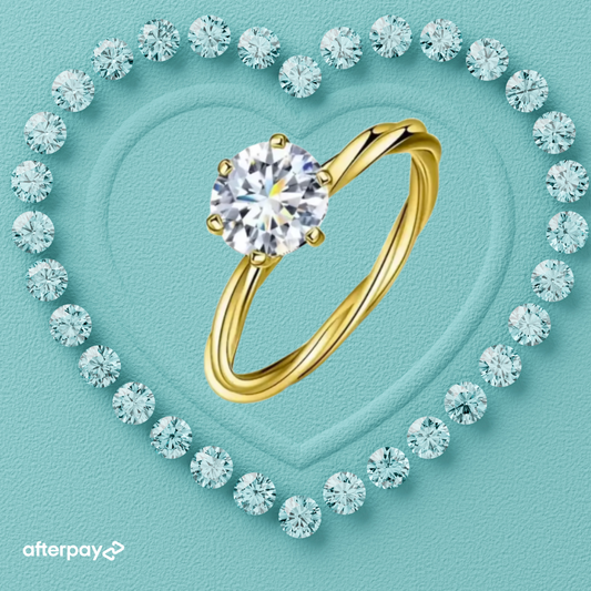 Yellow gold moissanite ring with round brilliant centre stone