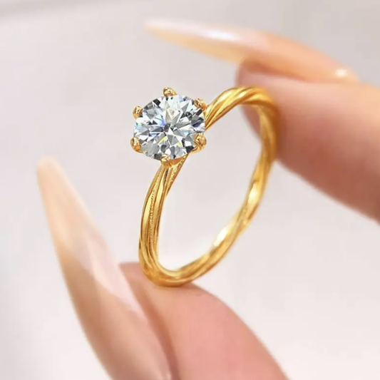 Round cut moissanite solitaire engagement ring in gold