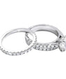 Three piece moissanite ring set with round centre stone and stacked pavé bands