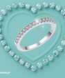 Pavé moissanite wedding band in sterling silver with sparkling round stones