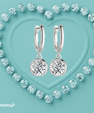 Bezel set moissanite drop earrings with silver huggie hoops