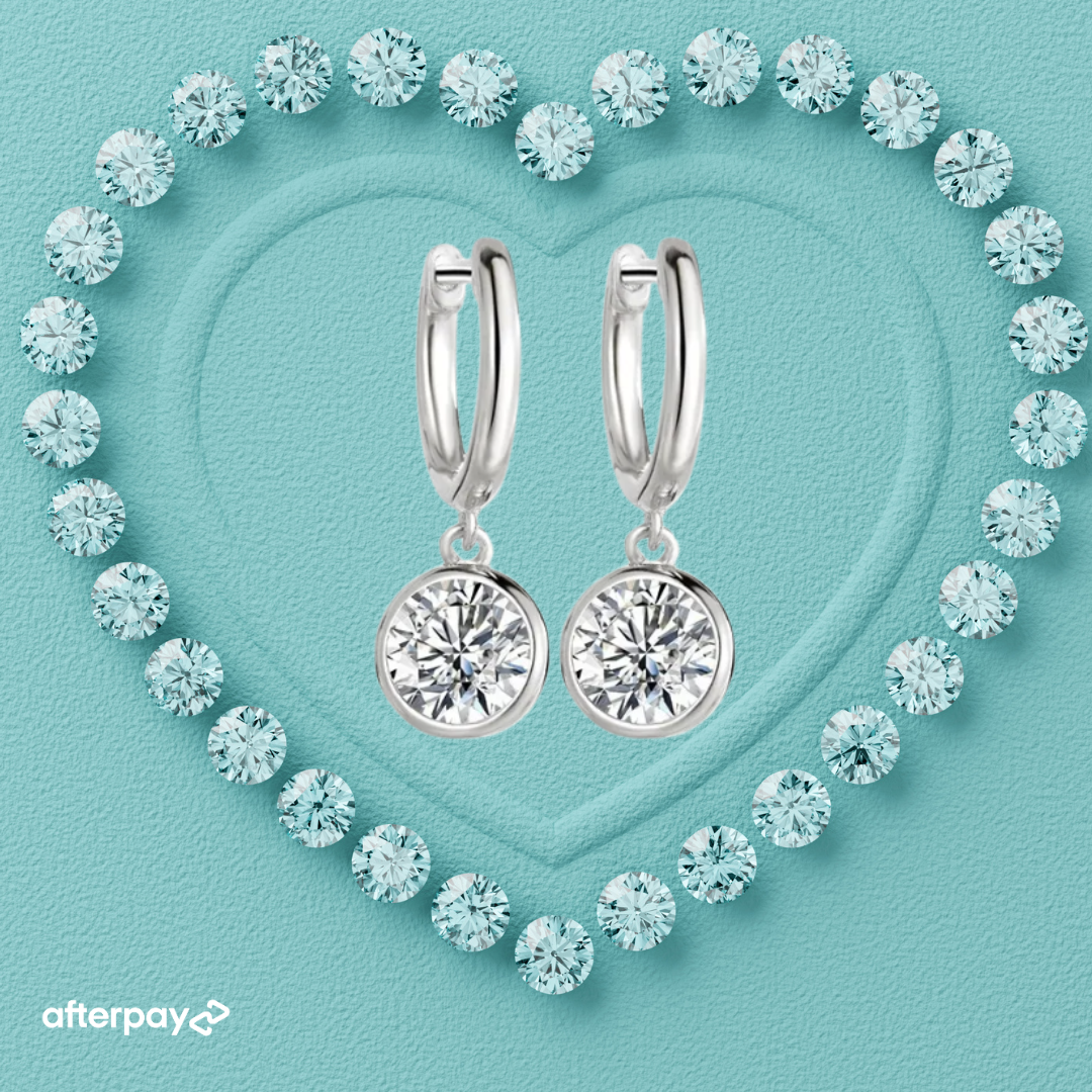 Bezel set moissanite drop earrings with silver huggie hoops