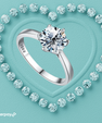 Round brilliant cut moissanite ring in yellow gold finish with classic solitaire setting.