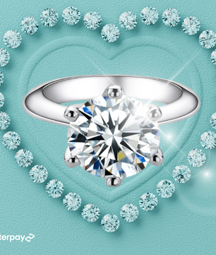 A Knife Edge Solitaire Moissanite Ring like the Tiffany Classic Setting