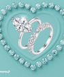 Marquise cut moissanite ring set with matching curved pavé wedding band