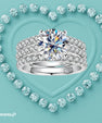 Triple moissanite ring set with round solitaire and pavé bands