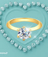 Knife edge moissanite ring with classic 6 claw setting
