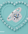 Round moissanite halo ring with cushion shaped halo and pavé band
