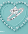 Heart shaped moissanite engagement ring with pavé band in sterling silver