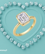 Emerald cut moissanite bezel ring with sleek modern setting