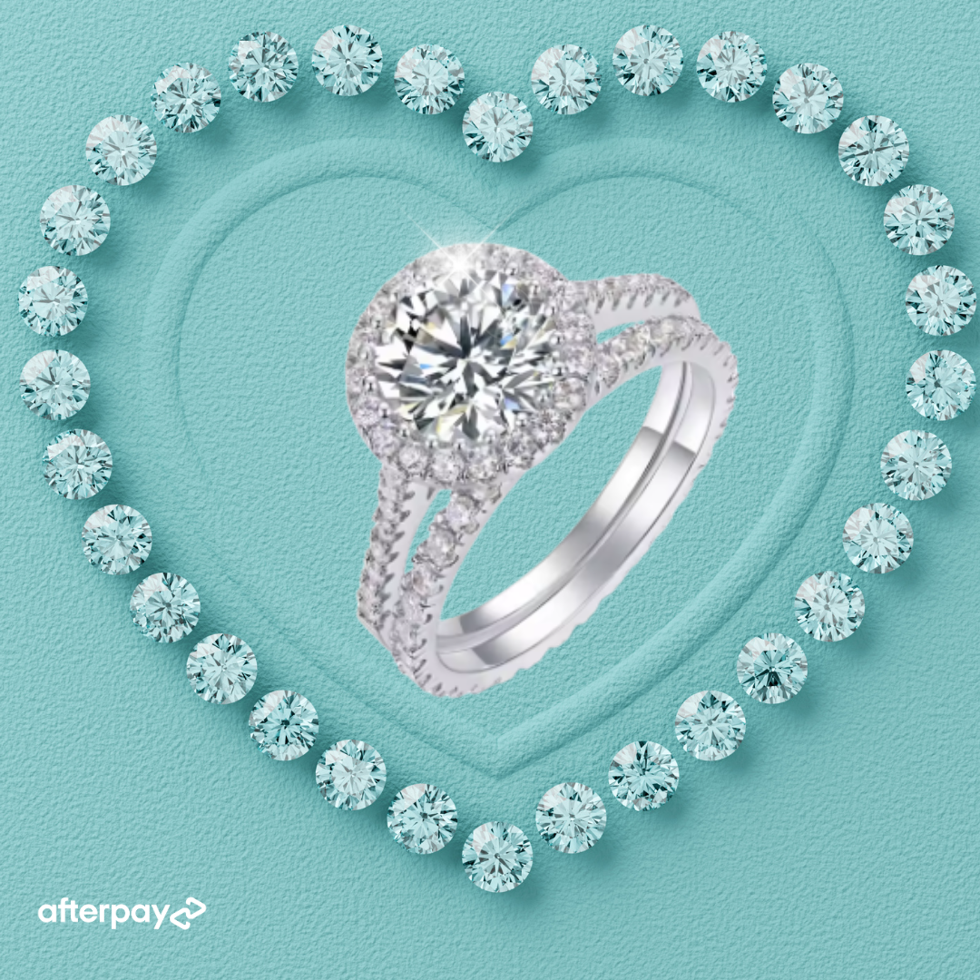 Round cut moissanite halo engagement ring set with matching band