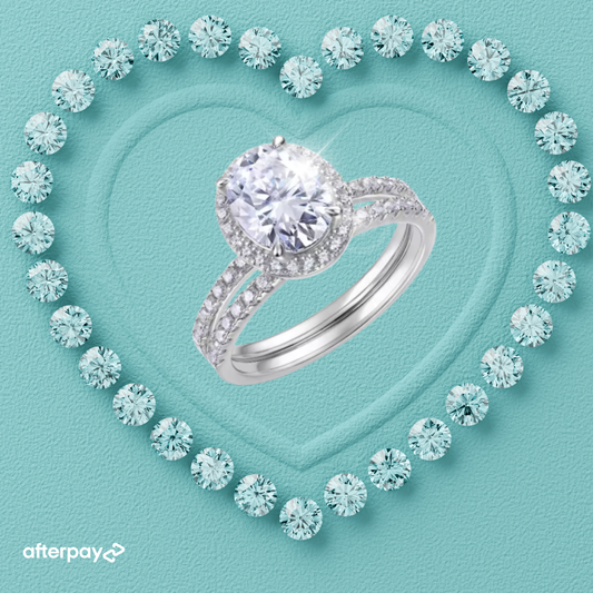 Oval halo moissanite ring set with matching pavé wedding band