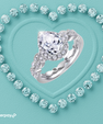 Pear moissanite ring set with sparkling teardrop centre stone and matching pavé wedding band