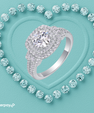 Heartline Halo Ring with a round brilliant centre stone, double halo setting and pavé band in white gold