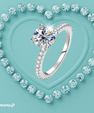Juliette Hidden Halo Ring featuring a 1 carat round moissanite in a four-prong setting with pavé band and hidden halo detail.