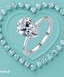 1 carat pear cut moissanite solitaire ring on a 14k gold filled band