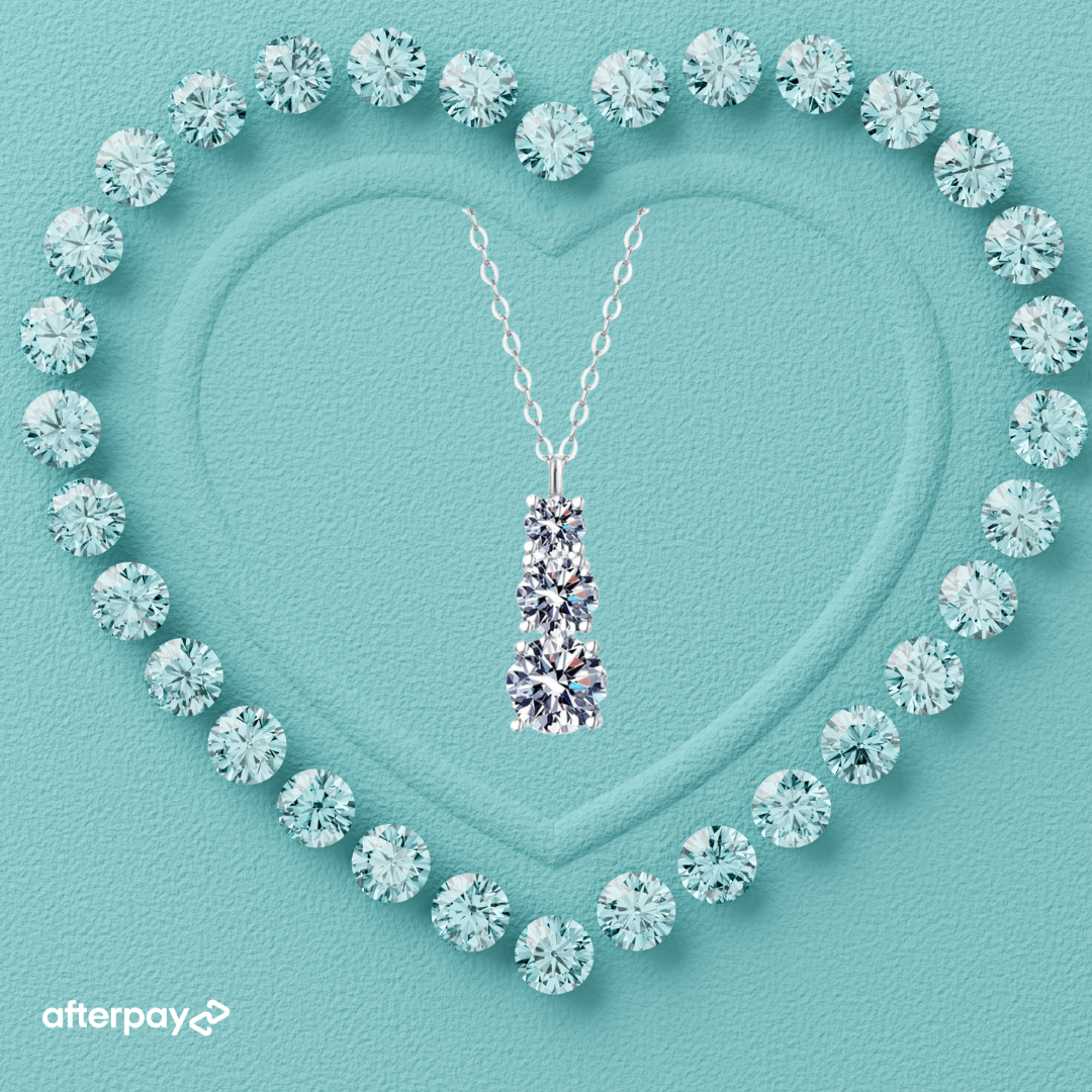 Nova 1.8ct moissanite gold-filled necklace with three sparkling stones on a delicate chain.