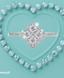 Amara 14k gold-filled ring with a floral-inspired sparkling cluster and stone-set band.