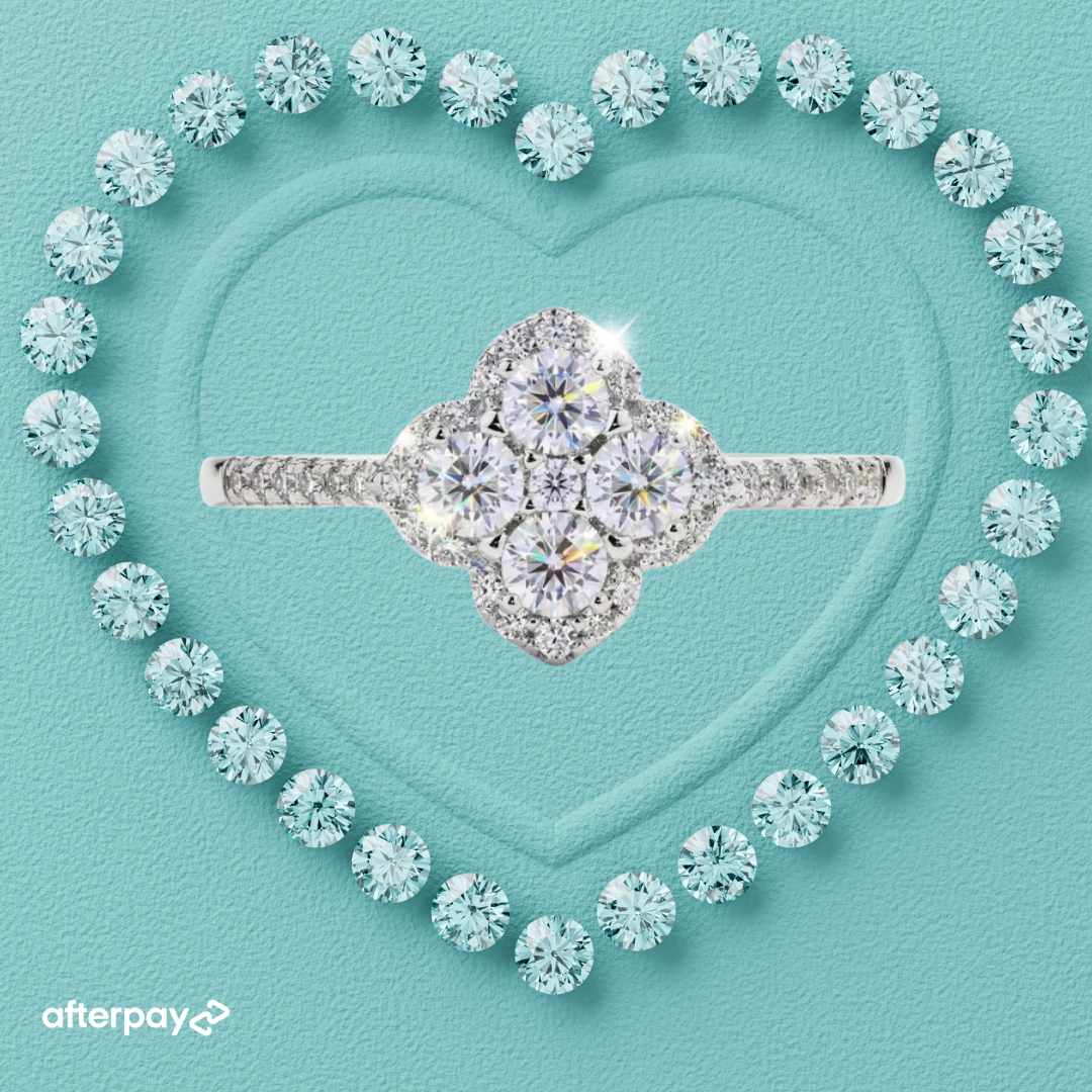 Amara 14k gold-filled ring with a floral-inspired sparkling cluster and stone-set band.