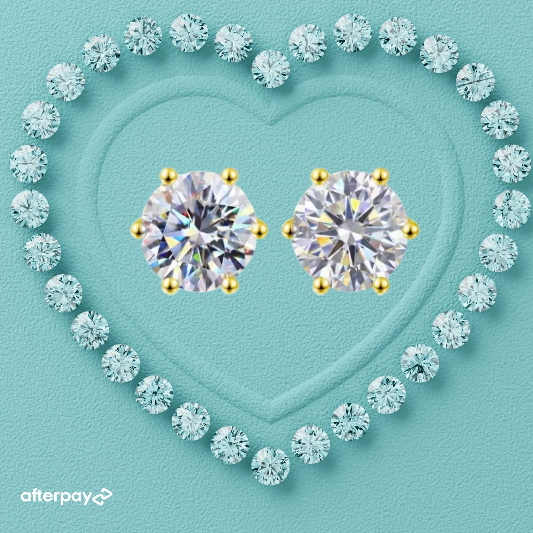 Estelle Gold Moissanite Studs featuring 1 carat round moissanite stones in a gold-coloured setting