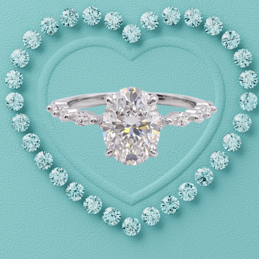 A silver engagement ring with a large oval center stone and marquise-cut side stones, centered on a turquoise heart-shaped background surrounded by small matching stones.