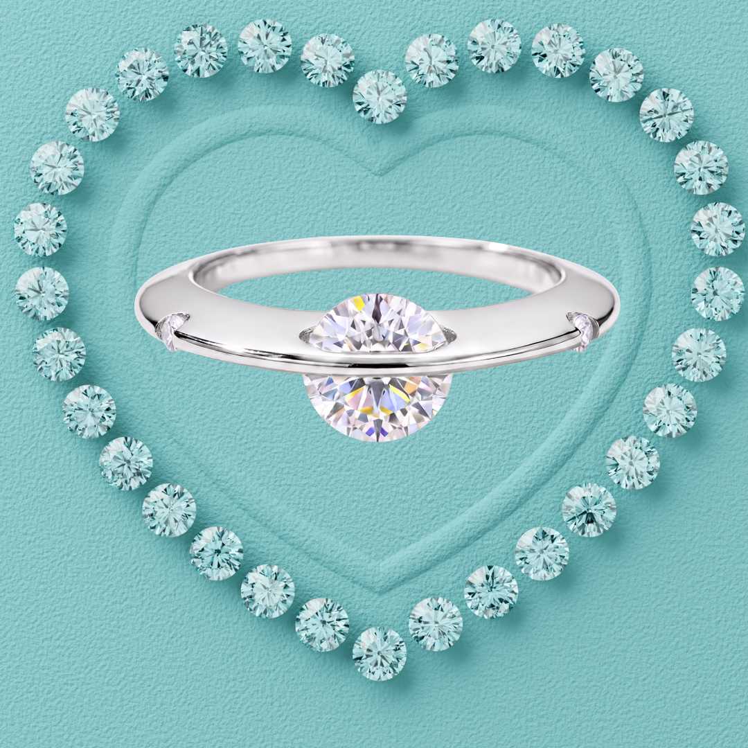 Saturn’s Kiss moissanite ring featuring a round centre stone crossed by a polished silver-toned band, with small side stones.