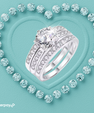 Round cut moissanite bridal ring set with matching pavé bands in sterling silver