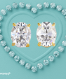 Oval cut moissanite stud earrings in sterling silver