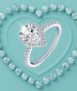 2 Carat Pear Cut Halo Moissanite Ring.