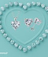 Heart shaped moissanite earrings and pendant set in sterling silver