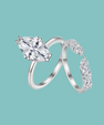Two piece marquise moissanite bridal set with pavé band