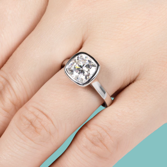 The Astra Bezel Set Moissanite Ring