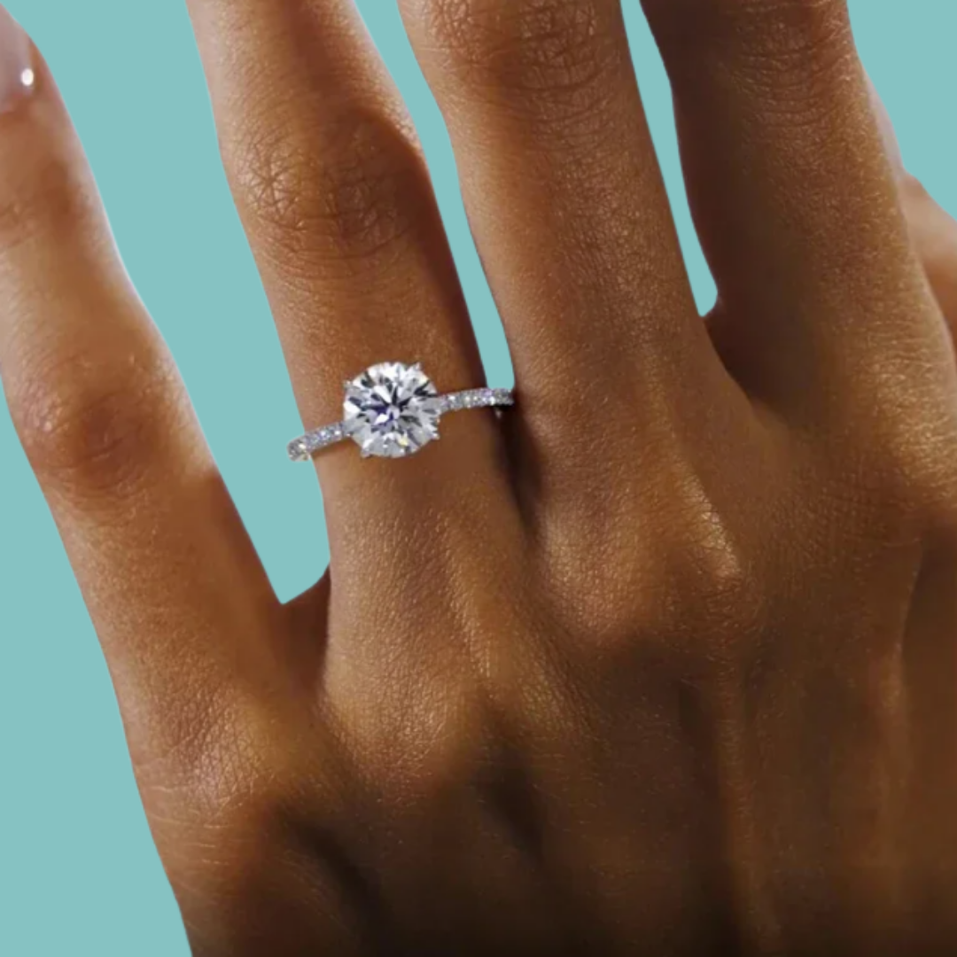 Hidden halo round engagement ring with brilliant centre stone
