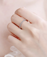 Classic moissanite pavé wedding band with shimmering stones set in silver