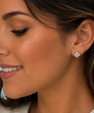 Fleurine floral moissanite stud earrings with yellow gold plating