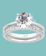 Elegant round moissanite ring set with sparkling matching band
