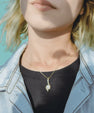 Sterling silver twist pendant necklace with sparkling moissanite