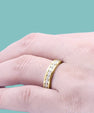 Elegant round moissanite band with timeless design