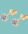 Moissanite stud earrings in solid gold with secure screwback setting