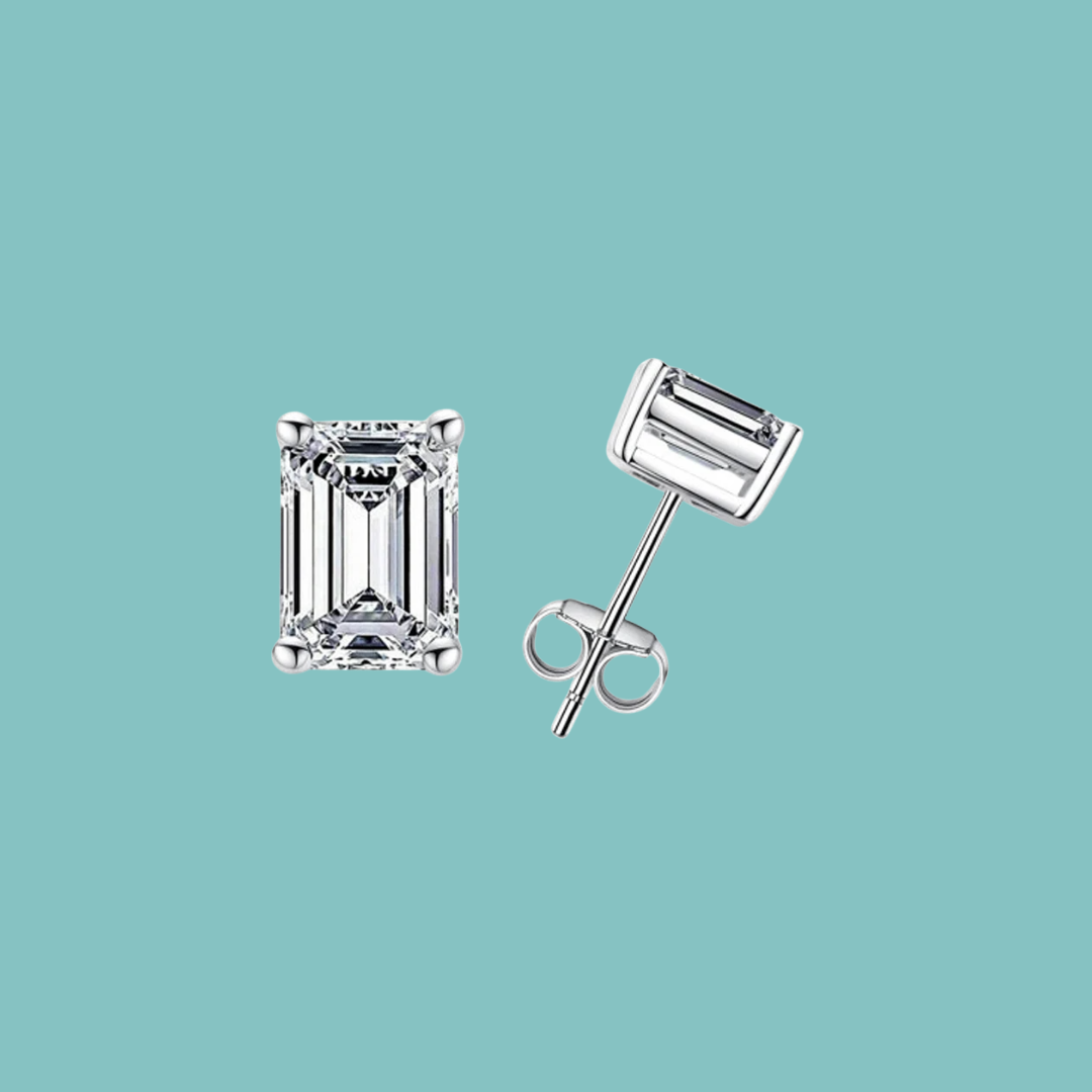 Emerald cut moissanite earrings and pendant set in sterling silver