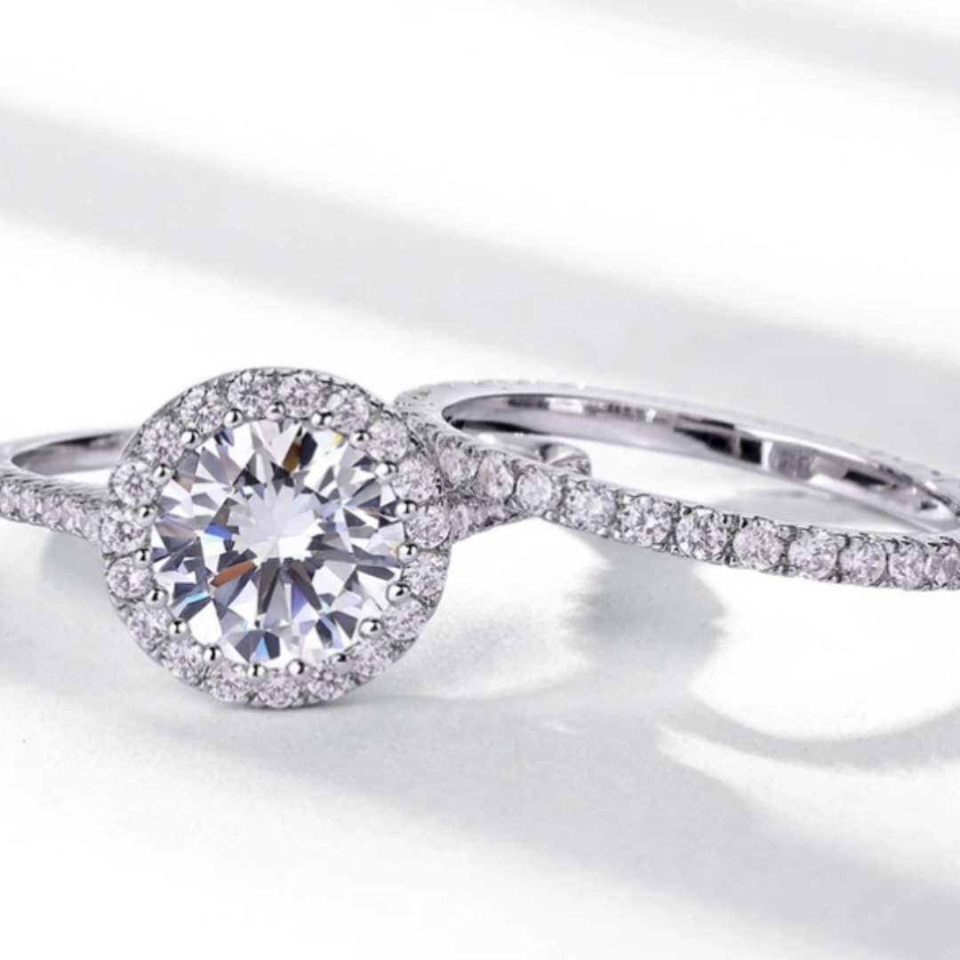 Round halo bridal ring set with sparkling centre stone and matching band