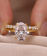 Oval moissanite ring set featuring a 4.5 carat centre stone and matching band