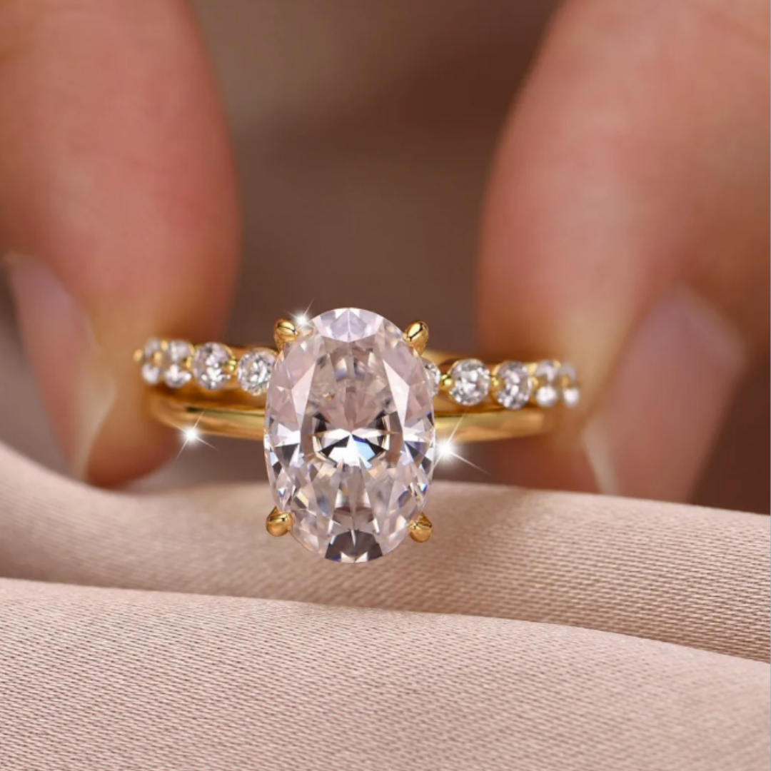 Oval moissanite ring set featuring a 4.5 carat centre stone and matching band