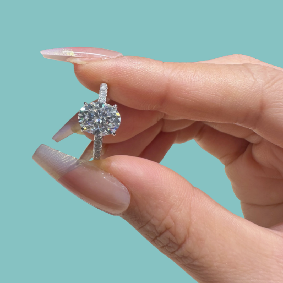 Elegant oval moissanite ring with pavé sterling silver band