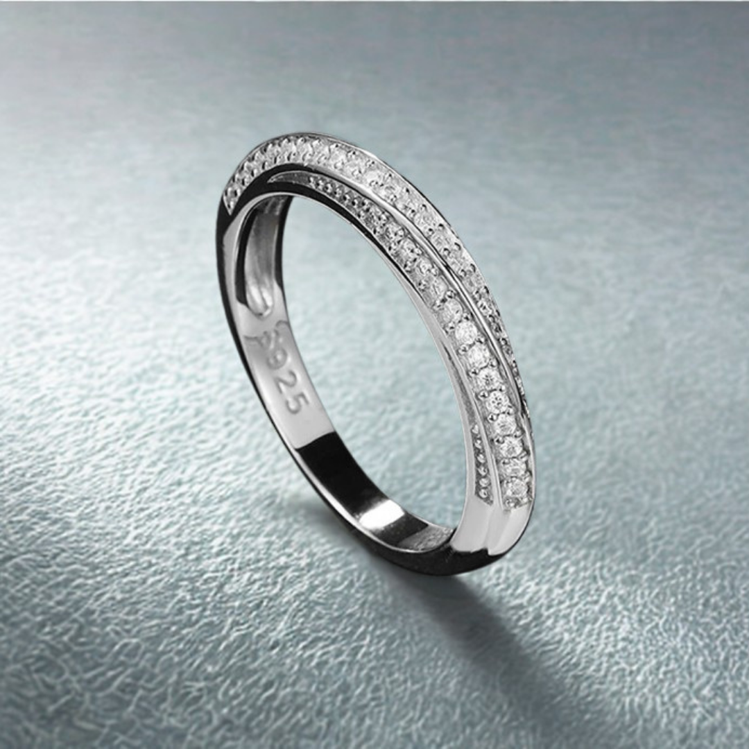 Stacking twist band with continuous sparkle in sterling silver and gold