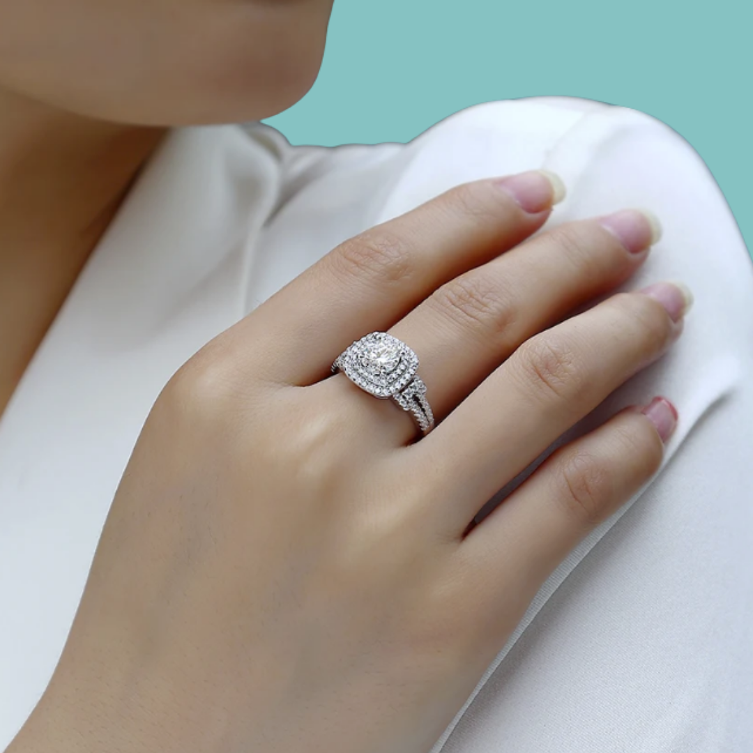 Heartline Halo Ring with a round brilliant centre stone, double halo setting and pavé band in white gold