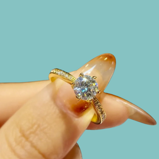 Serena moissanite ring featuring round centre stone and delicate pavé accents
