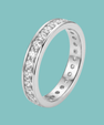 Close-up of a sparkling moissanite-style eternity band with polished silver finish