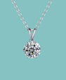 Brilliant round moissanite necklace with pointed starburst setting and V-shaped bail